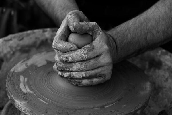 How can tourists engage in hands-on workshops about traditional British pottery in Staffordshire?